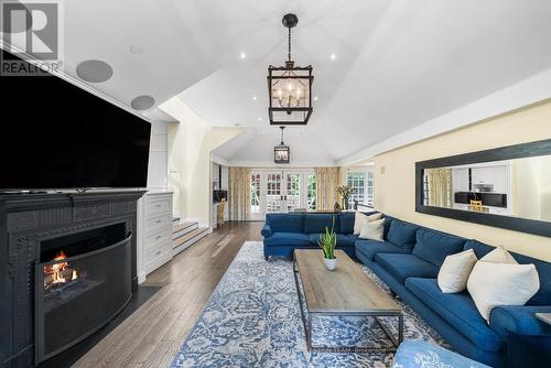 25 Strathgowan Crescent, Toronto, ON - Indoor Photo Showing Living Room With Fireplace