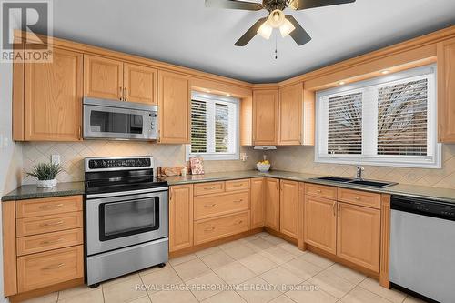 Light, bright Kitchen w/stainless appliances - 1582 Digby Street, Ottawa, ON - Indoor Photo Showing Kitchen With Double Sink