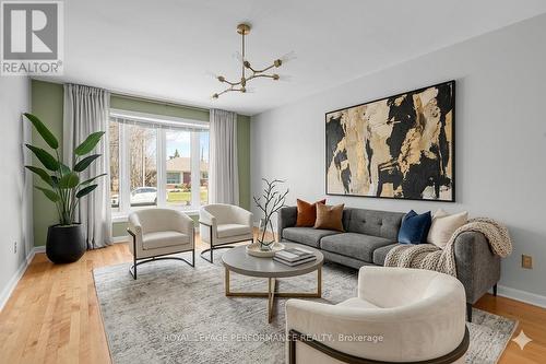 Living Room is virtually staged. - 1582 Digby Street, Ottawa, ON - Indoor Photo Showing Living Room