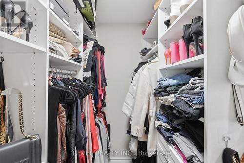 Primary Bedroom Walk In closet - 109 Ray Street N, Hamilton, ON - Indoor With Storage