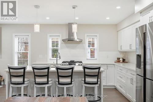 Quartz counters, S/S appliances, garburator - 109 Ray Street N, Hamilton, ON - Indoor