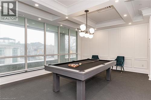 Expansive room with floor-to-ceiling windows, white wainscoting, and recessed lighting - 2060 Lakeshore Road Unit# 1501, Burlington, ON - Indoor Photo Showing Other Room