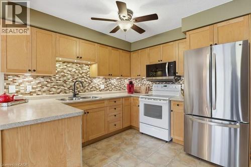 Bright and spacious kitchen - 42 Fallowfield Drive Unit# 15, Kitchener, ON - Indoor Photo Showing Kitchen With Stainless Steel Kitchen With Double Sink