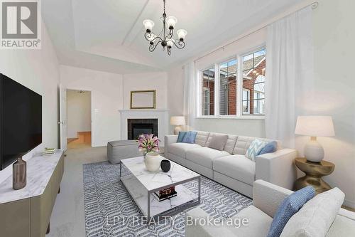UPPER LEVEL FAMILY ROOM - 49 Pennard Way, Ottawa, ON - Indoor Photo Showing Living Room With Fireplace