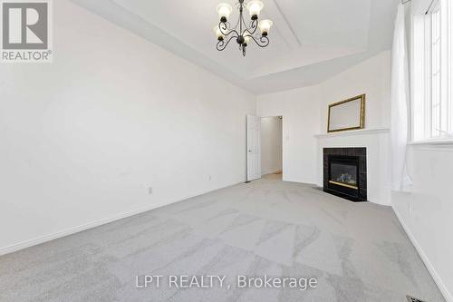 49 Pennard Way, Ottawa, ON - Indoor With Fireplace