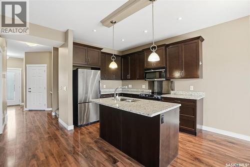111 115 Shepherd Crescent, Saskatoon, SK - Indoor Photo Showing Kitchen With Stainless Steel Kitchen With Double Sink With Upgraded Kitchen
