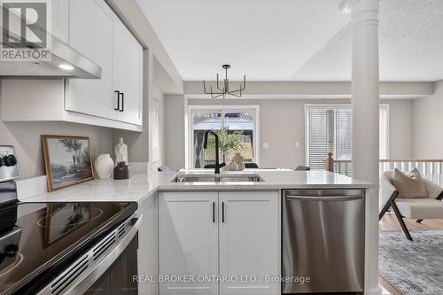 7048 Frontier Ridge, Mississauga, ON - Indoor Photo Showing Kitchen With Double Sink