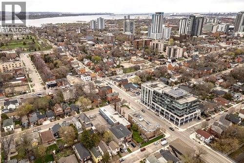 Aerial perspective of a multi-story building featuring extensive glazing - 128 Canada Street, Hamilton, ON - Outdoor With View