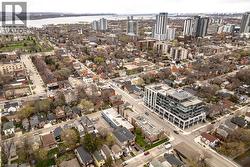 Aerial perspective of a multi-story building featuring extensive glazing - 