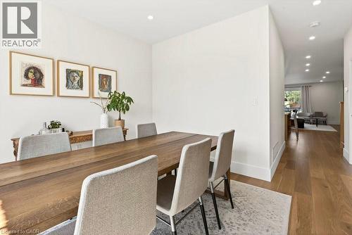 Dining area with recessed lighting, light wood-finish flooring, and white baseboards - 128 Canada Street, Hamilton, ON - Indoor