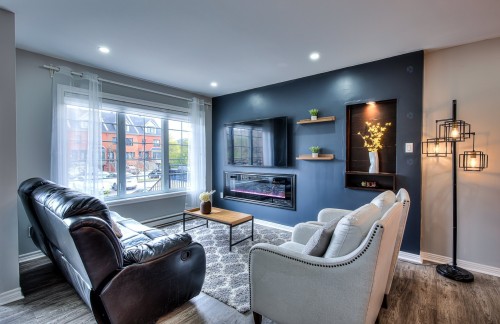 Living Room - 596 Rue Étienne-Lavoie, Laval (Sainte-Dorothée), QC - Indoor Photo Showing Living Room With Fireplace