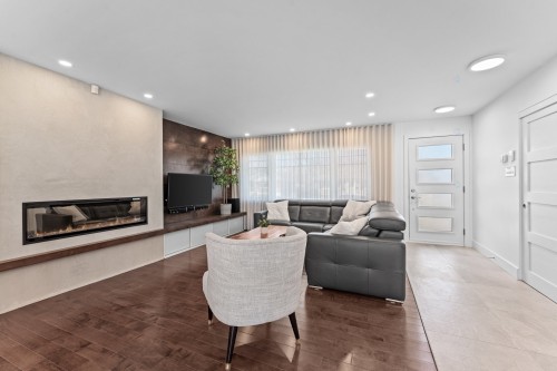 Salon - 237 Av. Vinet, Dorval, QC - Indoor Photo Showing Living Room With Fireplace