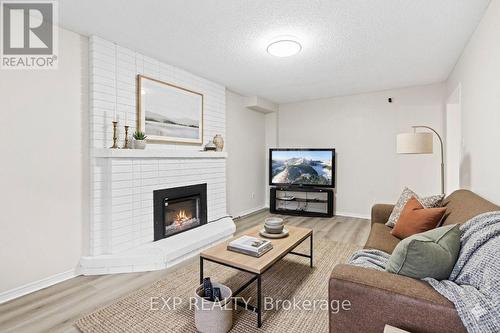 Main - 61 Dundee Crescent, Markham, ON - Indoor Photo Showing Living Room With Fireplace