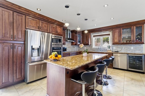 Cuisine - 3874 Rue Bergevin, Laval (Saint-Vincent-De-Paul), QC - Indoor Photo Showing Kitchen With Upgraded Kitchen