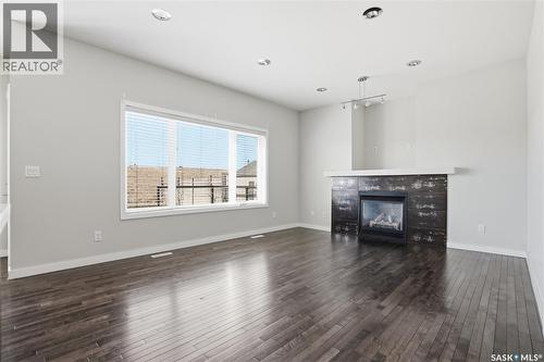 446 Pichler Crescent, Saskatoon, SK - Indoor Photo Showing Living Room With Fireplace