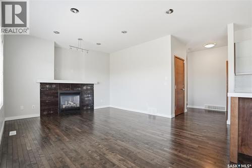 446 Pichler Crescent, Saskatoon, SK - Indoor Photo Showing Living Room With Fireplace