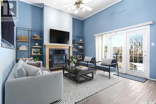 104 Lockwood Road, Regina, SK - Indoor Photo Showing Living Room With Fireplace