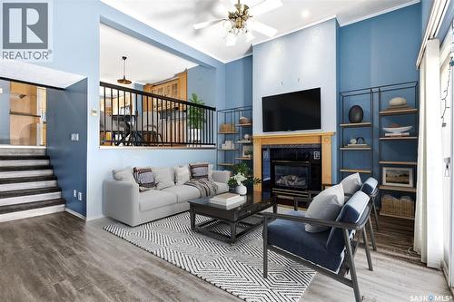 104 Lockwood Road, Regina, SK - Indoor Photo Showing Other Room With Fireplace