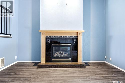 104 Lockwood Road, Regina, SK - Indoor Photo Showing Living Room With Fireplace