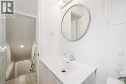 Modern vanity with an integrated sink and chrome faucet - 