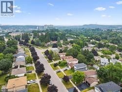 Residential neighborhood featuring mature trees and established homes - 
