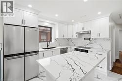 24 TREEVIEW Drive Toronto, ON M8W 4B9