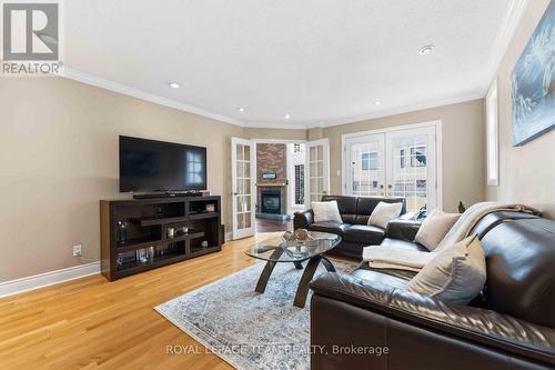 19 Hackett Street, Ottawa, ON - Indoor Photo Showing Living Room With Fireplace