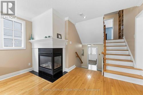 19 Hackett Street, Ottawa, ON - Indoor Photo Showing Living Room With Fireplace