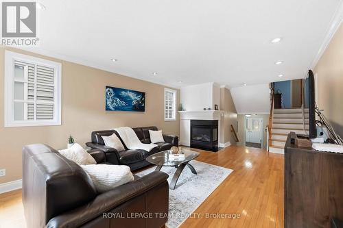 19 Hackett Street, Ottawa, ON - Indoor Photo Showing Living Room With Fireplace