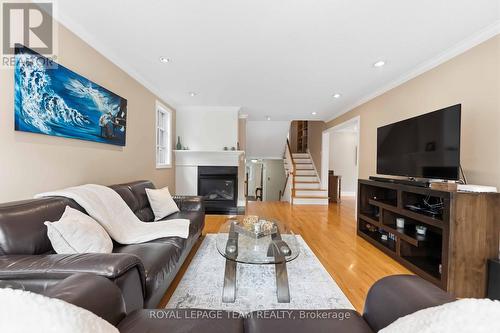 19 Hackett Street, Ottawa, ON - Indoor Photo Showing Living Room With Fireplace