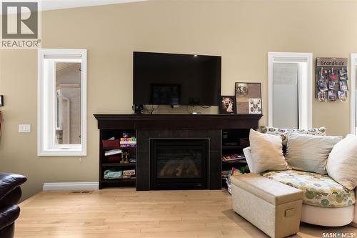 4505 Hames Crescent, Regina, SK - Indoor Photo Showing Living Room With Fireplace