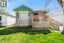 Stone-front exterior with a bay window and a covered front porch featuring wood railing and steps - 25 East 39Th Street, Hamilton, ON  - Outdoor With Exterior 