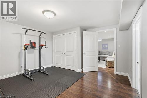 Dedicated exercise space featuring rubber mat flooring and neutral wall tones - 47 Winners Way, Binbrook, ON - Indoor Photo Showing Gym Room