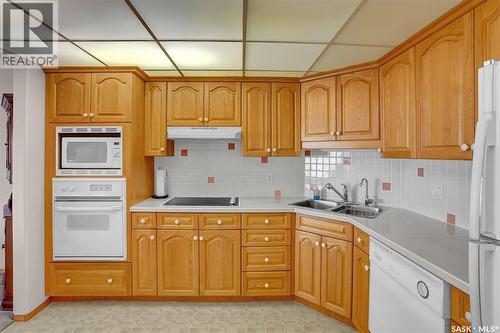 310 2050 College Avenue, Regina, SK - Indoor Photo Showing Kitchen With Double Sink