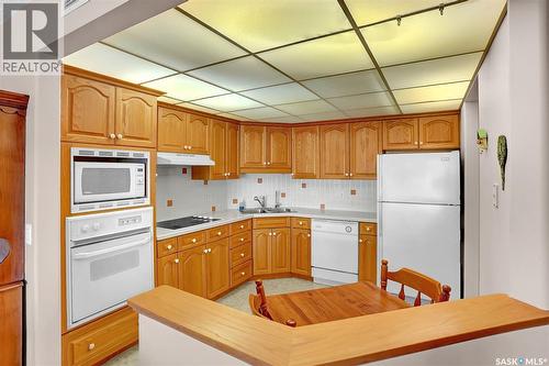 310 2050 College Avenue, Regina, SK - Indoor Photo Showing Kitchen With Double Sink