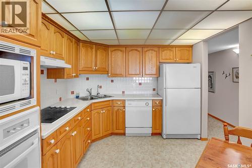 310 2050 College Avenue, Regina, SK - Indoor Photo Showing Kitchen With Double Sink