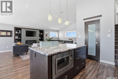 313 Prairie View Drive, Regina, SK - Indoor Photo Showing Kitchen With Fireplace With Upgraded Kitchen