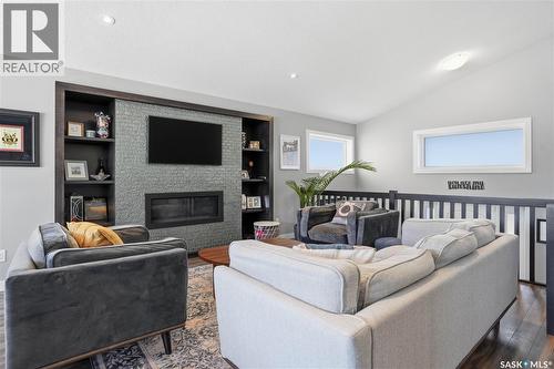313 Prairie View Drive, Regina, SK - Indoor Photo Showing Living Room With Fireplace