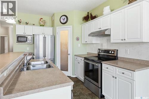 1655 Wingert Drive, Regina, SK - Indoor Photo Showing Kitchen With Stainless Steel Kitchen With Double Sink