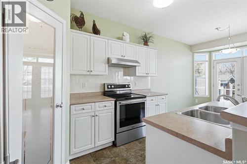 1655 Wingert Drive, Regina, SK - Indoor Photo Showing Kitchen With Double Sink
