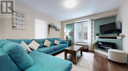 16 Edison Way, Whitby, ON - Indoor Photo Showing Living Room With Fireplace