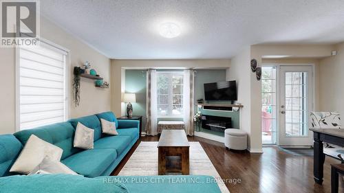 16 Edison Way, Whitby, ON - Indoor Photo Showing Living Room With Fireplace