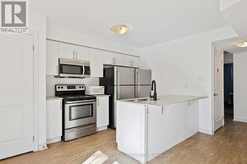 11 - 244 Penetanguishene Road, Barrie, ON - Indoor Photo Showing Kitchen With Double Sink