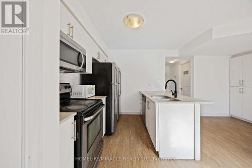 11 - 244 Penetanguishene Road, Barrie, ON - Indoor Photo Showing Kitchen