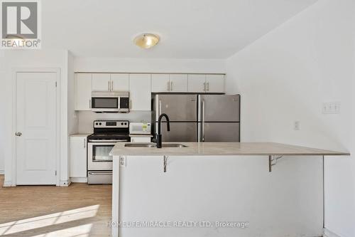 11 - 244 Penetanguishene Road, Barrie, ON - Indoor Photo Showing Kitchen