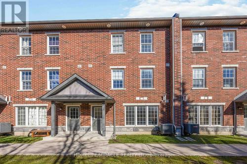 11 - 244 Penetanguishene Road, Barrie, ON - Outdoor With Facade
