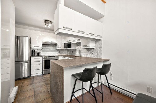 Kitchen - 302-3037 Boul. René-Laennec, Laval (Auteuil), QC - Indoor Photo Showing Kitchen