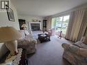 4815 Davis Avenue, Terrace, BC  - Indoor Photo Showing Living Room With Fireplace 