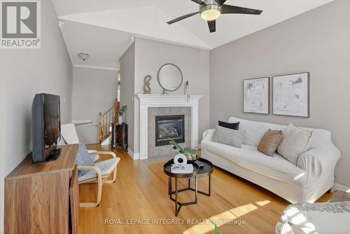 33 Grammercy Park, Ottawa, ON - Indoor Photo Showing Living Room With Fireplace
