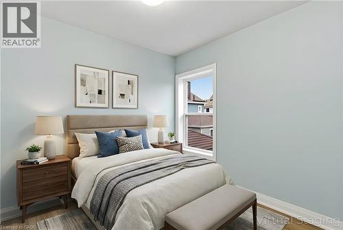 Light blue painted walls with white trim throughout - 149 Lottridge Street, Hamilton, ON - Indoor Photo Showing Bedroom